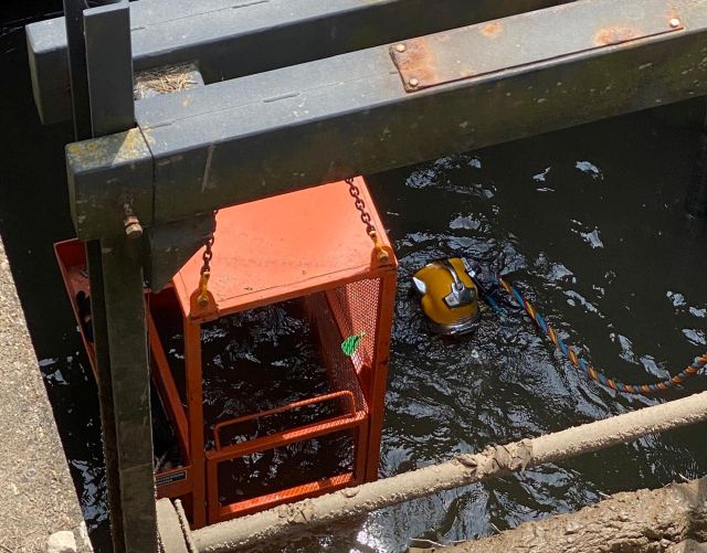Diver in water at Lutton Leam Referbishment Project