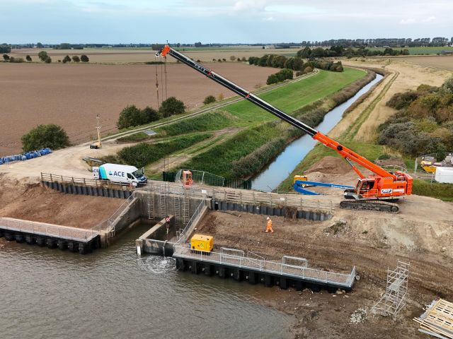 Crane lifting tidal doors into place at Lutton Leam Referbishment Project in September 2025