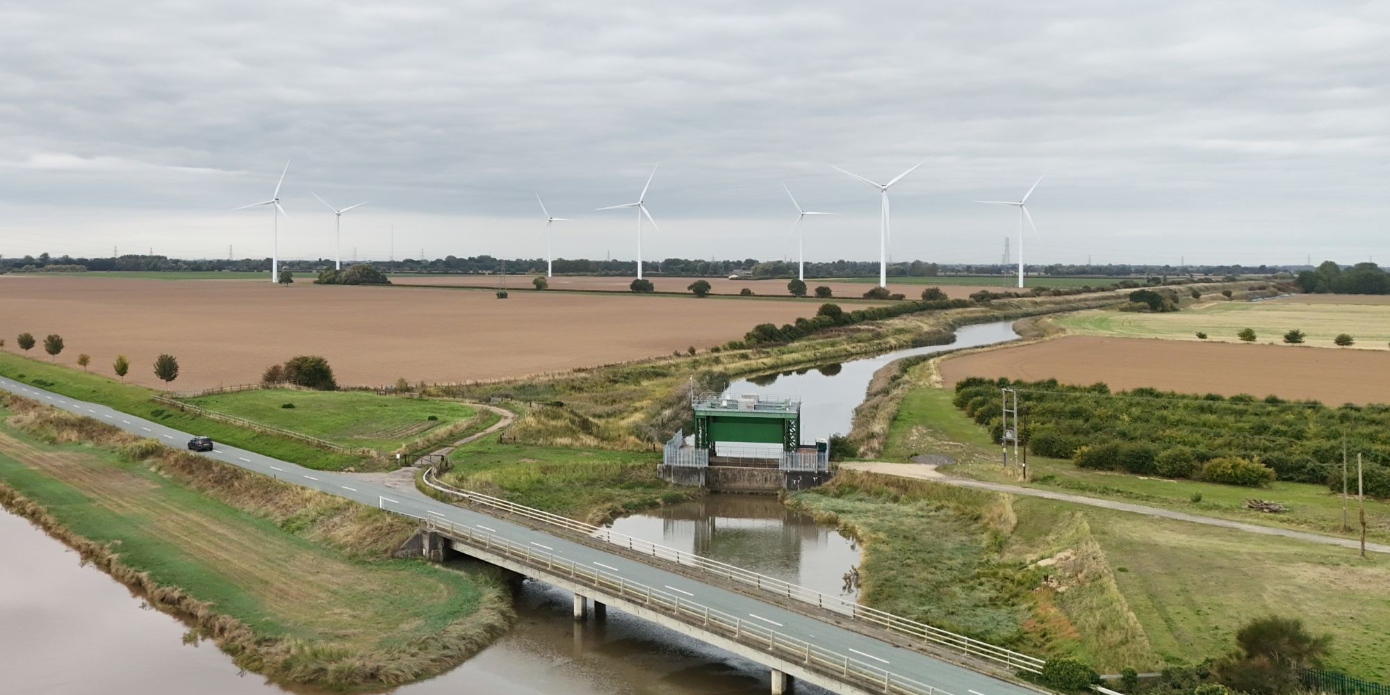 Panoramic Sutton Sluice and windfarm in South Holland arable landscape