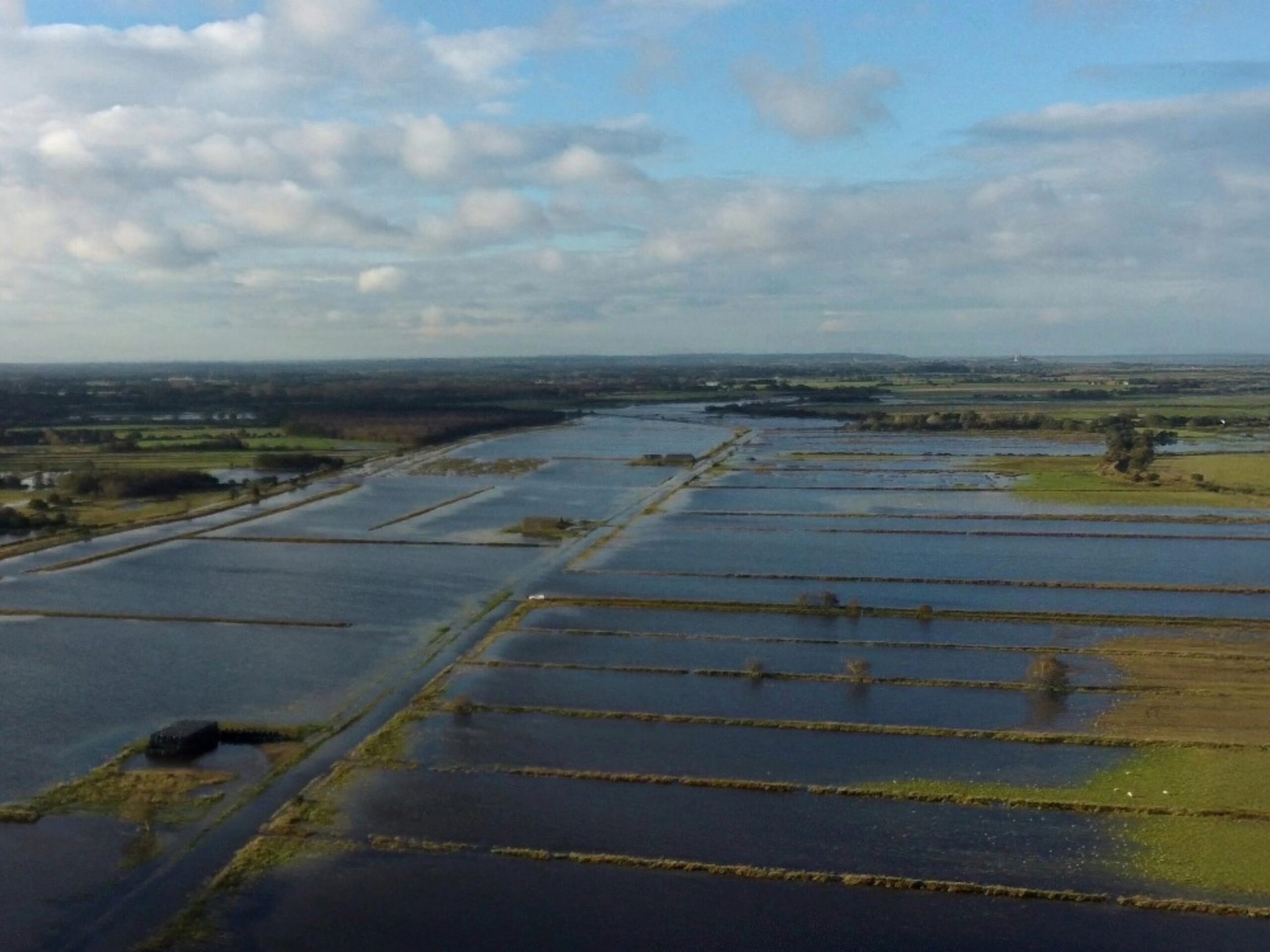 Broads IDB at Brograve Aerial image of flooding due to embankment overtopping in 2023