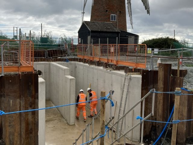 The newly formed concrete intake at horsey, with the old windpump in the background _Sep25